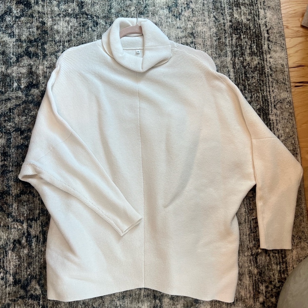 White turtleneck sweater